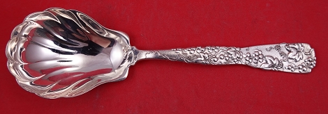 Berry Spoon fluted w/ grape motif  8 3/4